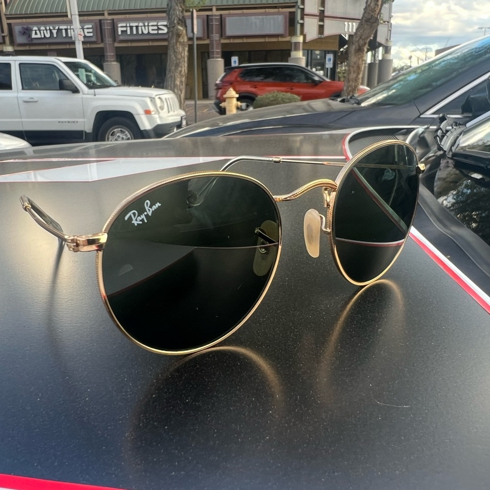Round metal Ray Ban sunglasses gold and green